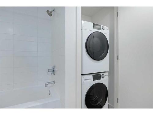 407-1118 12 Avenue Sw, Calgary, AB - Indoor Photo Showing Laundry Room