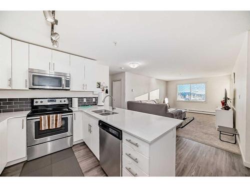 1310-181 Skyview Ranch Manor, Calgary, AB - Indoor Photo Showing Kitchen With Stainless Steel Kitchen With Double Sink