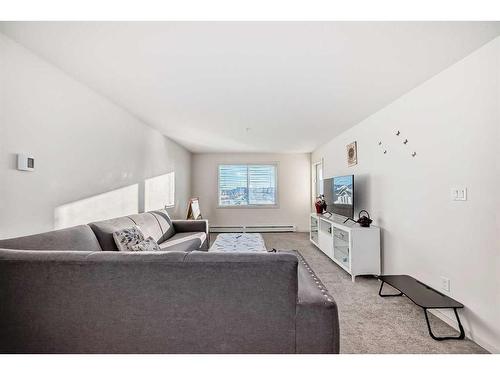 1310-181 Skyview Ranch Manor, Calgary, AB - Indoor Photo Showing Living Room