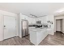 1310-181 Skyview Ranch Manor, Calgary, AB  - Indoor Photo Showing Kitchen With Stainless Steel Kitchen 