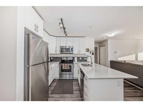 1310-181 Skyview Ranch Manor, Calgary, AB - Indoor Photo Showing Kitchen With Stainless Steel Kitchen With Double Sink With Upgraded Kitchen