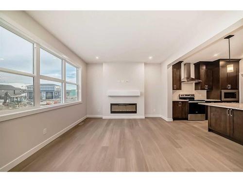 320 Homestead Grove Ne, Calgary, AB - Indoor With Fireplace