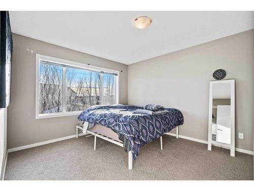 71 Copperpond Close Se, Calgary, AB - Indoor Photo Showing Bedroom