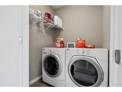 71 Copperpond Close Se, Calgary, AB - Indoor Photo Showing Laundry Room