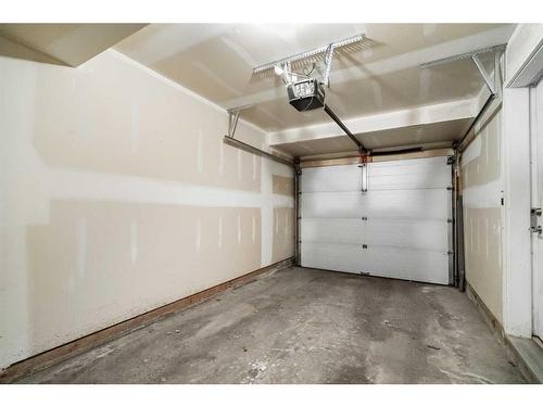 71 Copperpond Close Se, Calgary, AB - Indoor Photo Showing Garage