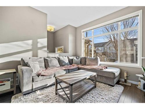 71 Copperpond Close Se, Calgary, AB - Indoor Photo Showing Living Room