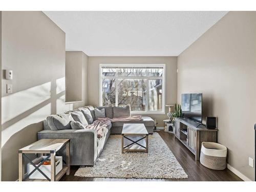 71 Copperpond Close Se, Calgary, AB - Indoor Photo Showing Living Room