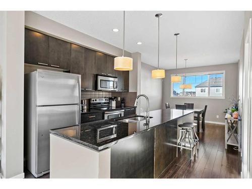 71 Copperpond Close Se, Calgary, AB - Indoor Photo Showing Kitchen With Stainless Steel Kitchen With Upgraded Kitchen