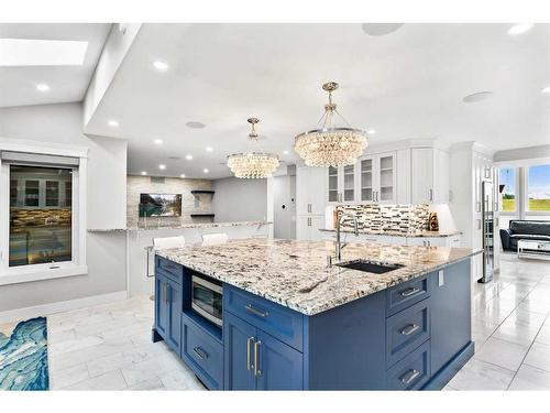 243 East Chestermere Drive, Chestermere, AB - Indoor Photo Showing Kitchen With Upgraded Kitchen