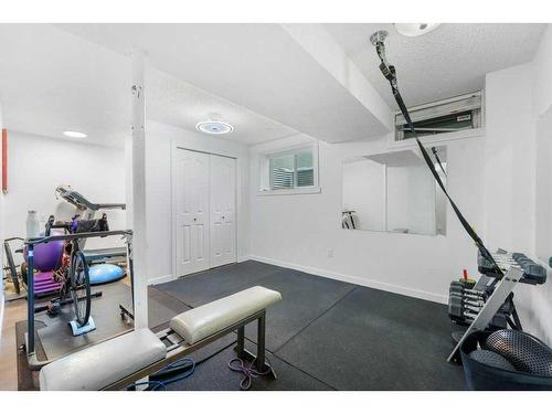 51 Lake Wapta Rise Se, Calgary, AB - Indoor Photo Showing Gym Room