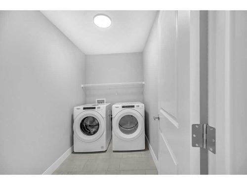 117 Masters Row Se, Calgary, AB - Indoor Photo Showing Laundry Room