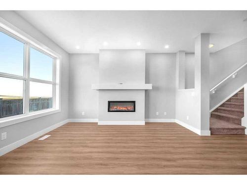 117 Masters Row Se, Calgary, AB - Indoor With Fireplace