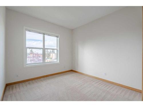 226-1920 14 Avenue Ne, Calgary, AB - Indoor Photo Showing Other Room