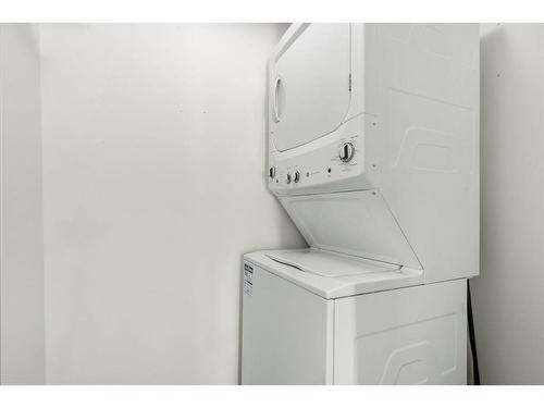 4214-1620 70 Street Se, Calgary, AB - Indoor Photo Showing Laundry Room