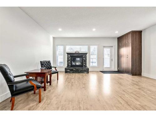 1414 26A Street Sw, Calgary, AB - Indoor Photo Showing Living Room With Fireplace