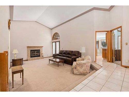 99 Oakmount Court Sw, Calgary, AB - Indoor With Fireplace