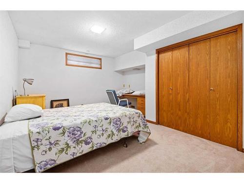 99 Oakmount Court Sw, Calgary, AB - Indoor Photo Showing Bedroom