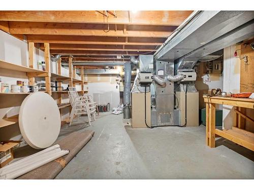 99 Oakmount Court Sw, Calgary, AB - Indoor Photo Showing Basement