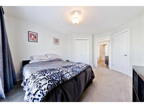 17 Tuscany Valley Park Nw, Calgary, AB - Indoor Photo Showing Bedroom