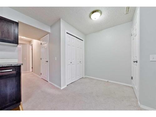 17 Tuscany Valley Park Nw, Calgary, AB - Indoor Photo Showing Other Room