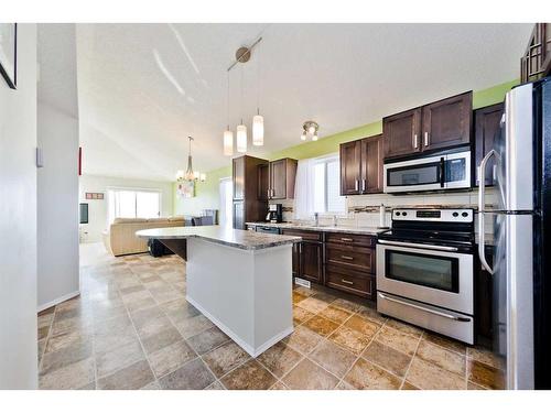 17 Tuscany Valley Park Nw, Calgary, AB - Indoor Photo Showing Kitchen With Upgraded Kitchen