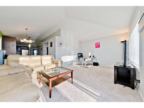 17 Tuscany Valley Park Nw, Calgary, AB - Indoor Photo Showing Living Room