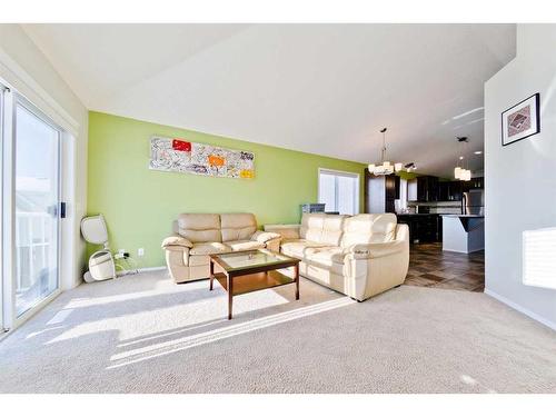 17 Tuscany Valley Park Nw, Calgary, AB - Indoor Photo Showing Living Room