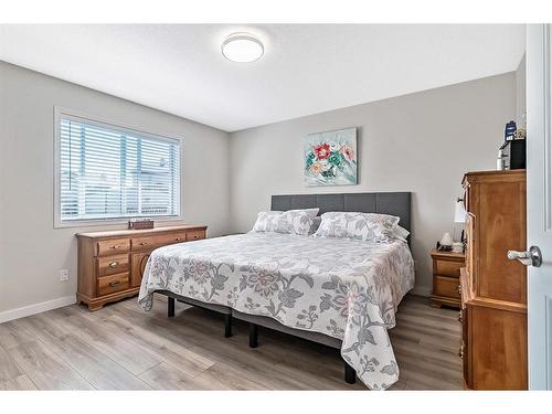 336 Willow Ridge Manor, Diamond Valley, AB - Indoor Photo Showing Bedroom