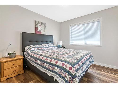 336 Willow Ridge Manor, Diamond Valley, AB - Indoor Photo Showing Bedroom