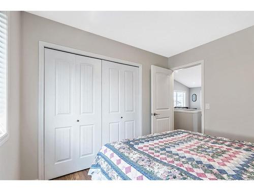 336 Willow Ridge Manor, Diamond Valley, AB - Indoor Photo Showing Bedroom