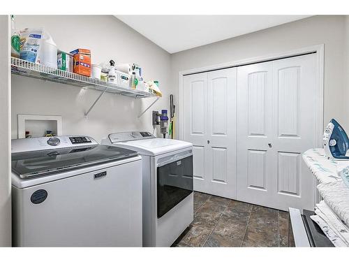 336 Willow Ridge Manor, Diamond Valley, AB - Indoor Photo Showing Laundry Room