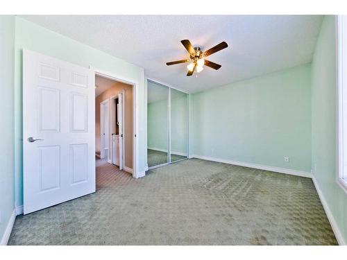 165 Harvest Rose Circle Ne, Calgary, AB - Indoor Photo Showing Other Room