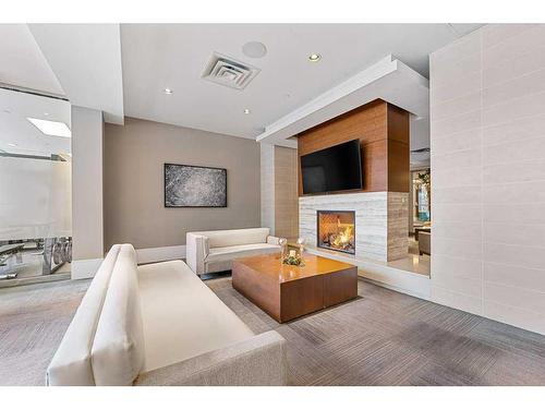 812-222 Riverfront Avenue Sw, Calgary, AB - Indoor With Fireplace