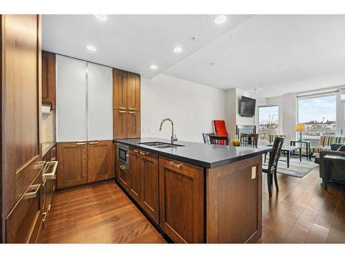 812-222 Riverfront Avenue Sw, Calgary, AB - Indoor Photo Showing Kitchen With Double Sink