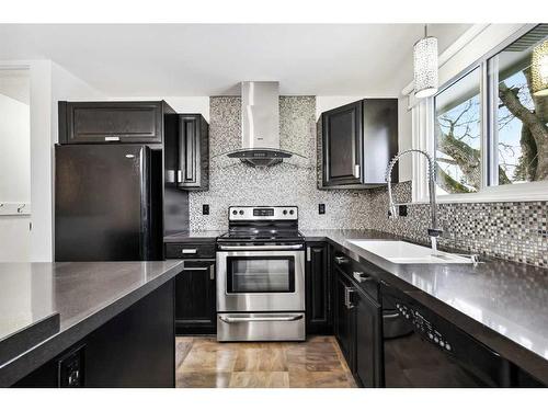 455 Cedarpark Drive Sw, Calgary, AB - Indoor Photo Showing Kitchen With Upgraded Kitchen