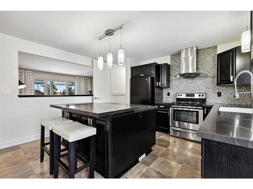 455 Cedarpark Drive Sw, Calgary, AB - Indoor Photo Showing Kitchen With Upgraded Kitchen