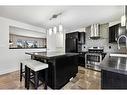 455 Cedarpark Drive Sw, Calgary, AB  - Indoor Photo Showing Kitchen With Upgraded Kitchen 