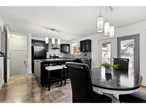 455 Cedarpark Drive Sw, Calgary, AB - Indoor Photo Showing Dining Room