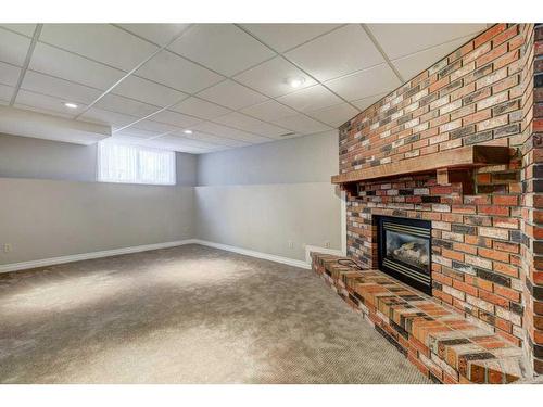 14547 Parkland Boulevard Se, Calgary, AB - Indoor With Fireplace