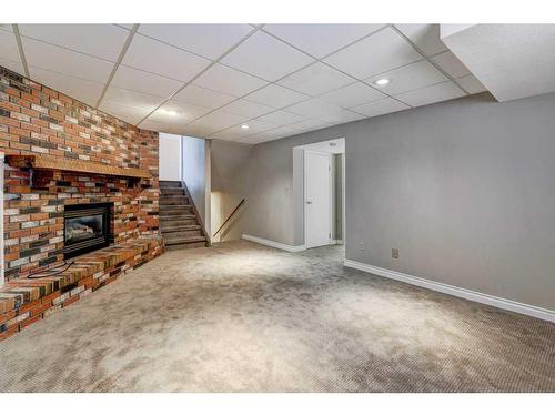 14547 Parkland Boulevard Se, Calgary, AB - Indoor With Fireplace