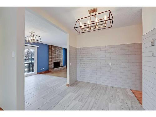 9927 5 Street Se, Calgary, AB - Indoor Photo Showing Other Room