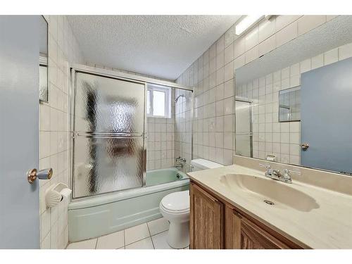 9927 5 Street Se, Calgary, AB - Indoor Photo Showing Bathroom