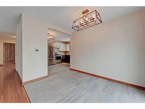 9927 5 Street Se, Calgary, AB - Indoor Photo Showing Other Room