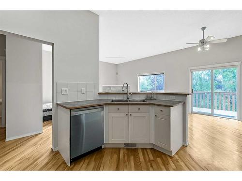 265 Somerside Park Sw, Calgary, AB - Indoor Photo Showing Kitchen With Double Sink