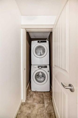 3109-115 Prestwick Villas Se, Calgary, AB - Indoor Photo Showing Laundry Room