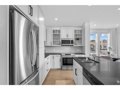 16 Cornerbrook Way Ne, Calgary, AB - Indoor Photo Showing Kitchen With Stainless Steel Kitchen With Double Sink With Upgraded Kitchen