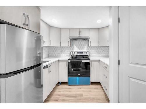 16 Cornerbrook Way Ne, Calgary, AB - Indoor Photo Showing Kitchen With Stainless Steel Kitchen