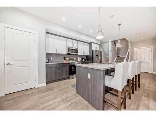 1-1714 Kensington Road Nw, Calgary, AB - Indoor Photo Showing Kitchen With Upgraded Kitchen