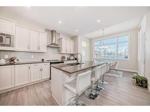 158 Seton Gardens Se, Calgary, AB - Indoor Photo Showing Kitchen With Upgraded Kitchen