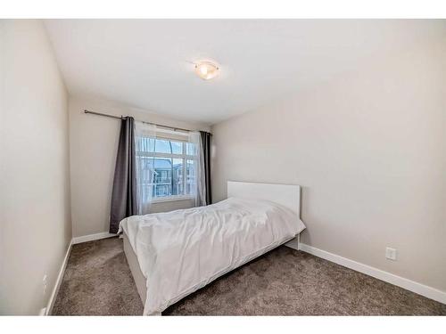 158 Seton Gardens Se, Calgary, AB - Indoor Photo Showing Bedroom